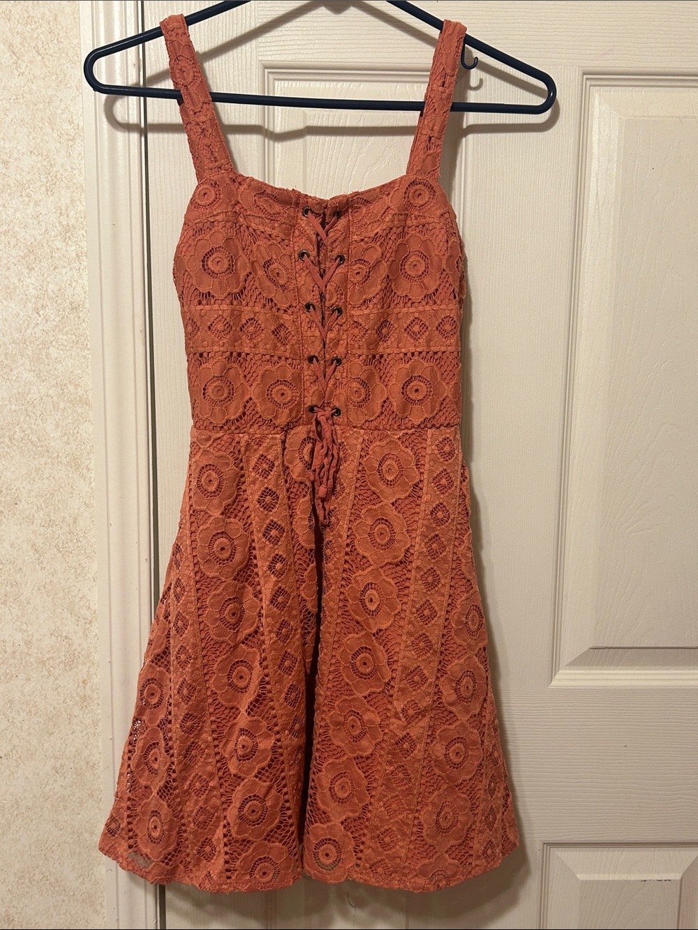 Juniors Lace One-Piece Dress in Rust Orange